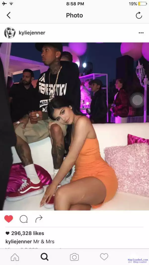 Kylie Jenner just captioned this pic of her and Tyga with *Mr & Mrs*
